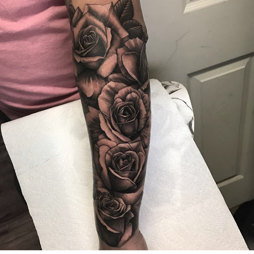 Explore cute dinosaur tattoo ideas, creative tattoo ideas in Atlanta, available at Golden Anchor Tattoo