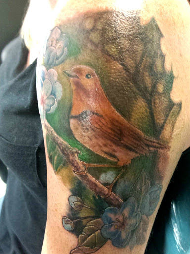 Explore cover up tattoo ideas for men, creative tattoo ideas in Durham, available at Skin City Body Art