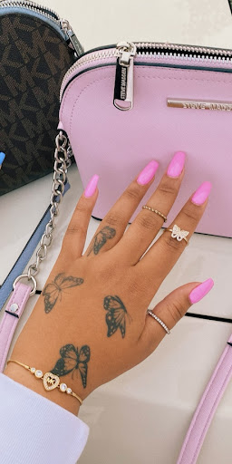 Find under breast tattoo ideas for your next unique tattoo in Concord at Sterling Tattoo Club