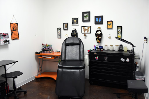 Explore flower garden tattoo ideas, creative tattoo ideas in Wisconsin Dells, available at Twisted Dimensions Tattoo Studio