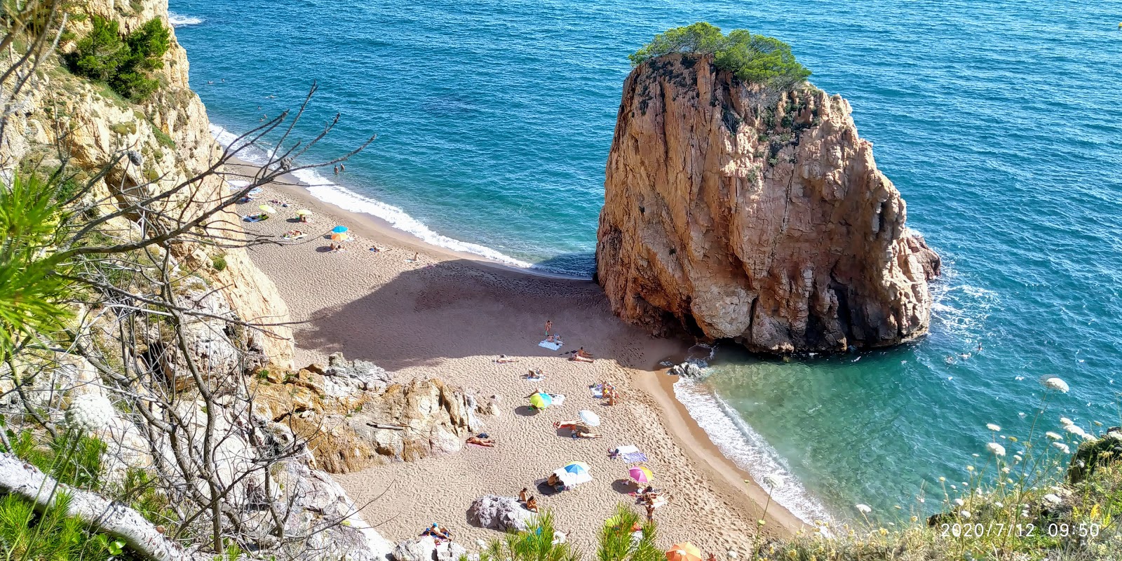 Foto van Platja de l'Illa Roja met helder zand oppervlakte