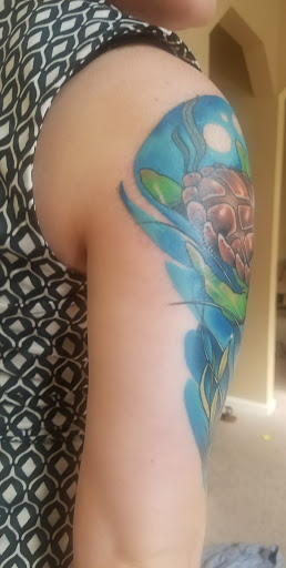 Explore buddhist tattoo ideas, creative tattoo ideas in Virginia Beach, available at Studio Evolve