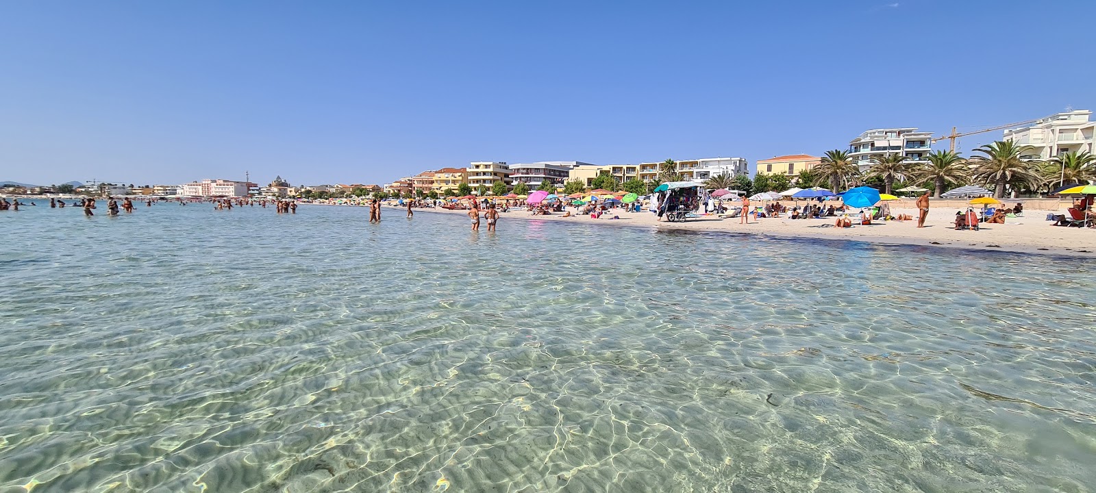 Foto de Playa de Lido di Alghero con parcialmente limpio nivel de limpieza
