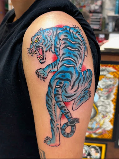 Explore nail technician tattoo ideas, creative tattoo ideas in Harrisonburg, available at Alley Cat Tattoo