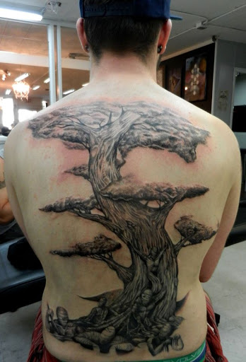 Explore mens thumb tattoo ideas, creative tattoo ideas in Bradenton, available at Sacred Arts Tattoo Bradenton