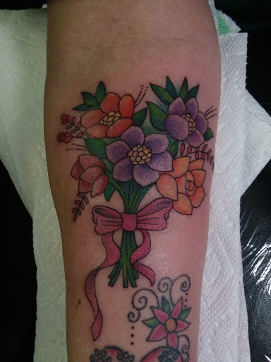 Explore angel memorial tattoo ideas, creative tattoo ideas in Philadelphia, available at Tattoo Odyssey Inc