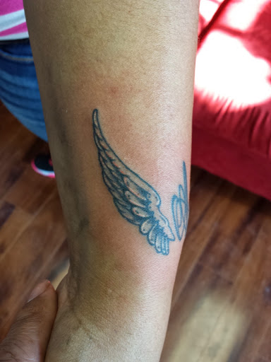 Explore women's arm tattoos ideas, creative tattoo ideas in Indianapolis, available at A-1 Art Tattoos LLC