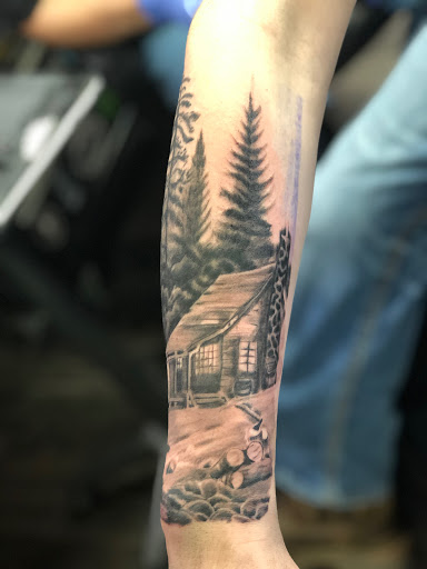 Explore tricep tattoo ideas for men, creative tattoo ideas in Bridgeport, available at Breaking skin tattoo and body piercing