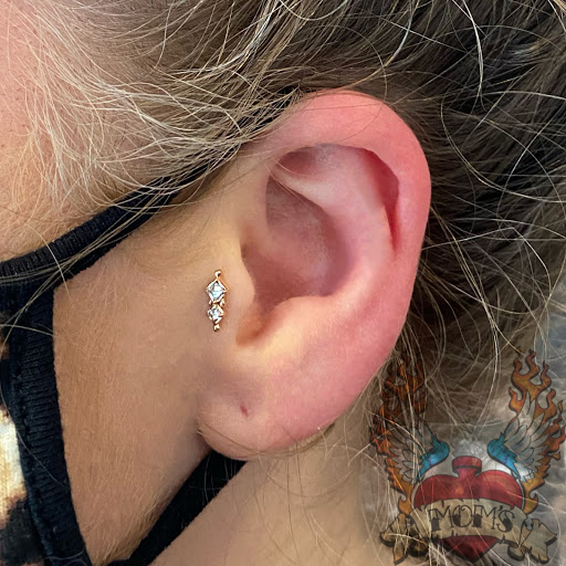 Explore knee surgery tattoo ideas, creative tattoo ideas in Spokane, available at Moms Custom Tattoo & Body Piercing