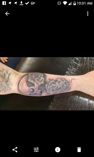 Explore mens wedding band tattoo ideas, creative tattoo ideas in La Crosse, available at La Crosse Tattoo