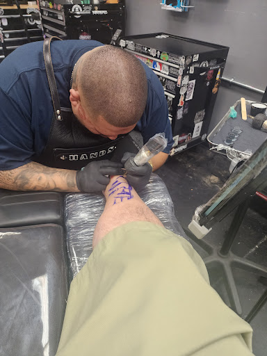 Explore partner tattoo ideas, creative tattoo ideas in Orange, available at Ink Activitiez Tattoo