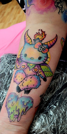 Explore cover up foot tattoo ideas, creative tattoo ideas in Benton, available at Spectrum Tattoo