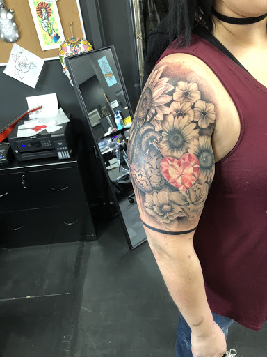 Explore neck tattoo ideas for guys, creative tattoo ideas in Middletown, available at Traditionally Twisted Tattoo