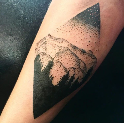 Explore skull and rose tattoo ideas, creative tattoo ideas in San Diego, available at Sideshow Tattoo and Piercing