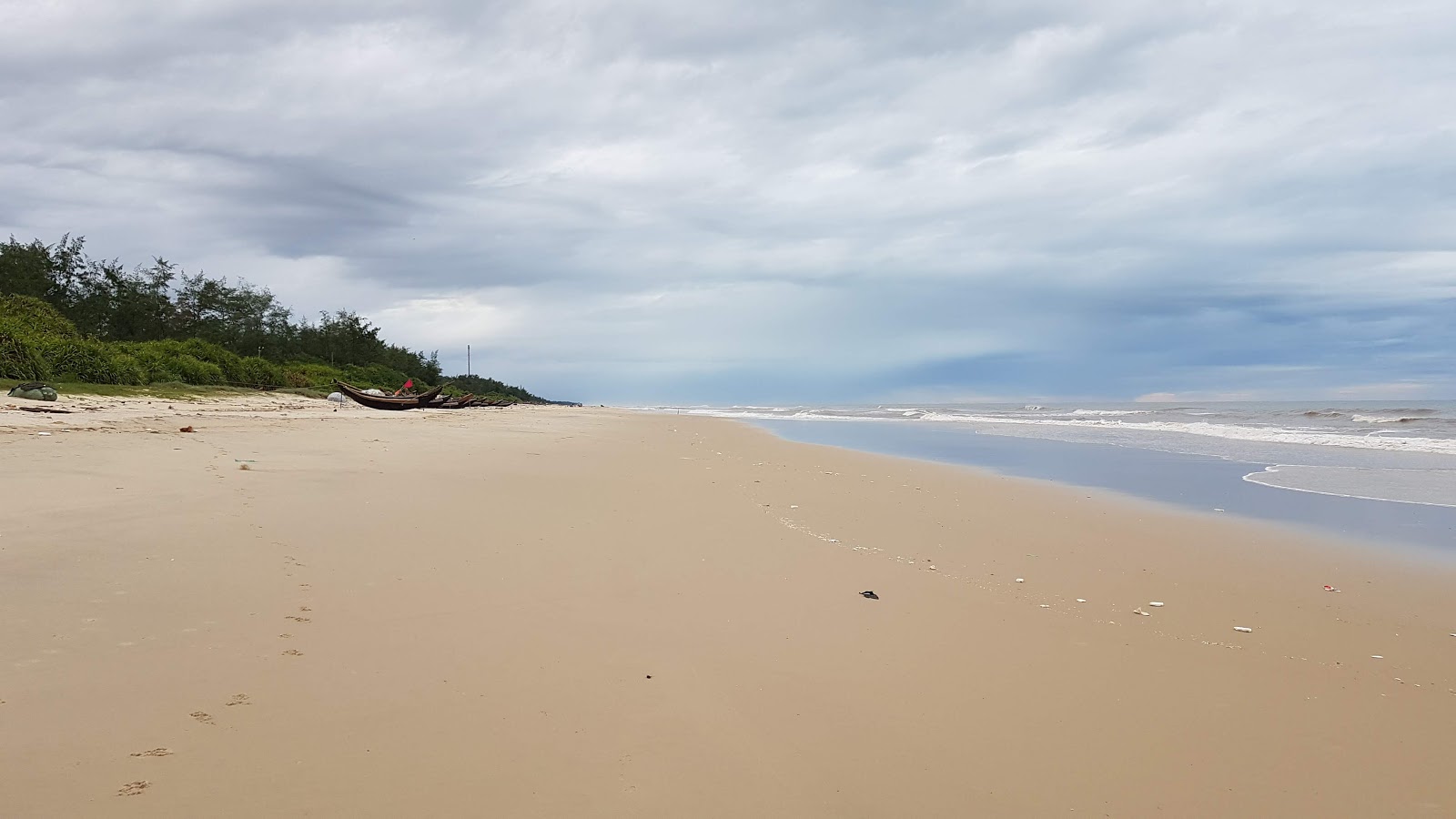 Fotografija Tan An Beach z svetel pesek površino
