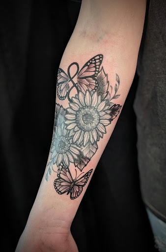 Explore never again tattoo ideas, creative tattoo ideas in Rochester, available at Axe of Kindness Tattoo