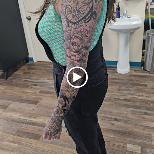 Explore sunflower thigh tattoo ideas, creative tattoo ideas in Traverse City, available at Pinups & Needles