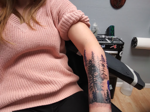 Explore cross hand tattoo ideas, creative tattoo ideas in Osage Beach, available at Sweet Ink Tattoo