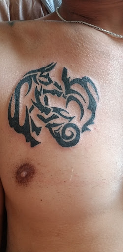 Explore praying tattoo ideas, creative tattoo ideas in Littleton, available at Living Canvas Tattoo and Piercing