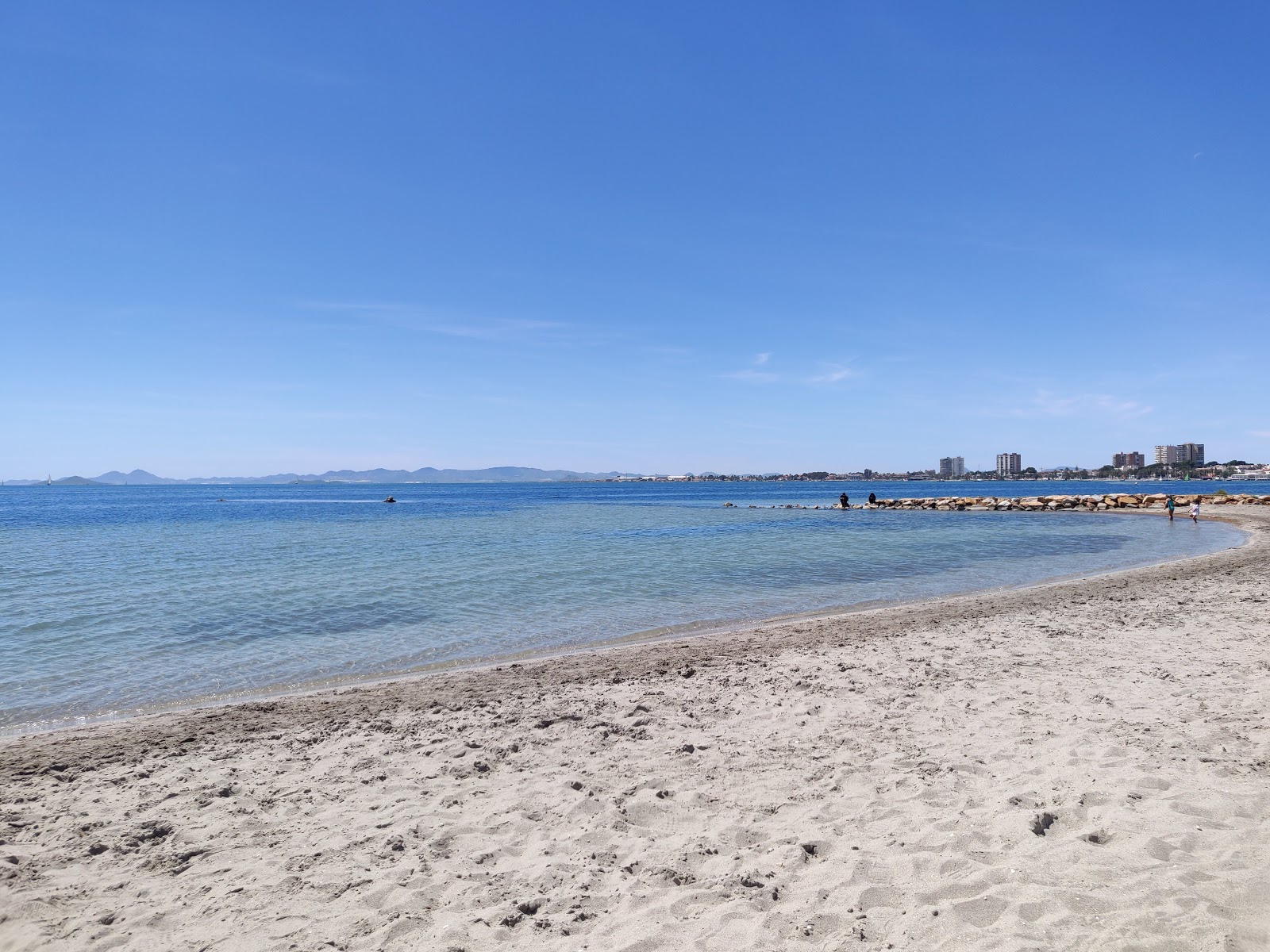 Fotografie cu Playa la Puntica cu o suprafață de nisip gri