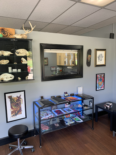 Explore electric guitar tattoo ideas, creative tattoo ideas in Newfoundland, available at Okami Tattoo