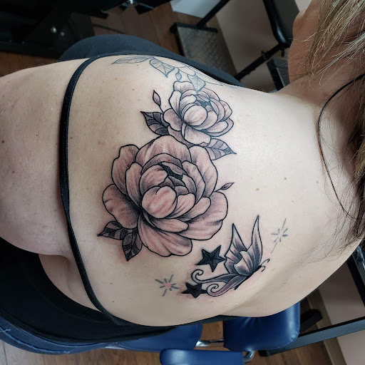 Explore tattoo cover up ideas on neck, creative tattoo ideas in Fort Payne, available at Broken Arrow Tattoo Co.