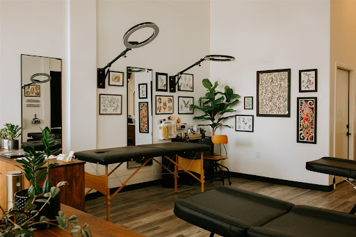 Explore february birth flower tattoo ideas, creative tattoo ideas in San Diego, available at Wish Tattoo