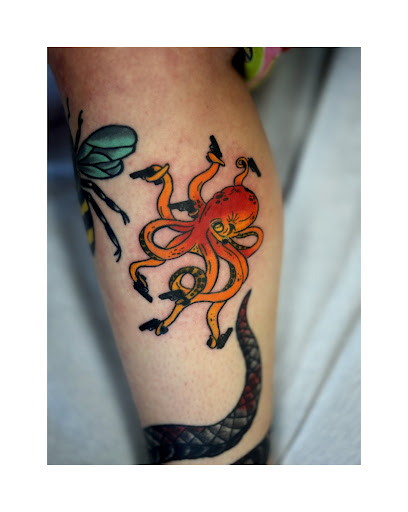 Explore wrist wrap tattoo ideas, creative tattoo ideas in Greenfield Center, available at Apothecary Ink