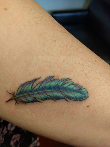 Explore daughter father tattoo ideas, creative tattoo ideas in Clawson, available at Eternal Tattoos