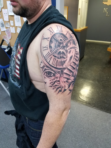 Tattoo Shop «Next Level Tattoo Company - Imlay City», reviews and photos, 420 E 3rd St, Imlay City, MI 48444, USA