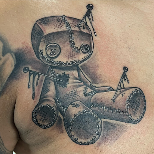 Find bride of chucky tattoo ideas for your next unique tattoo in Pittsburg at Delta Art & Tattoo