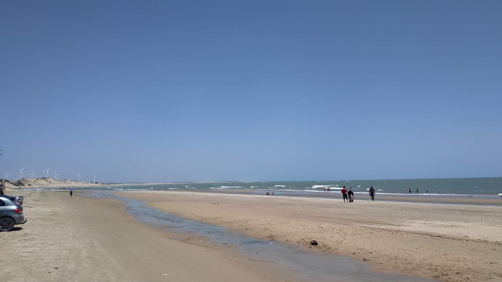 Zdjęcie Praia de Caetanos z powierzchnią jasny piasek