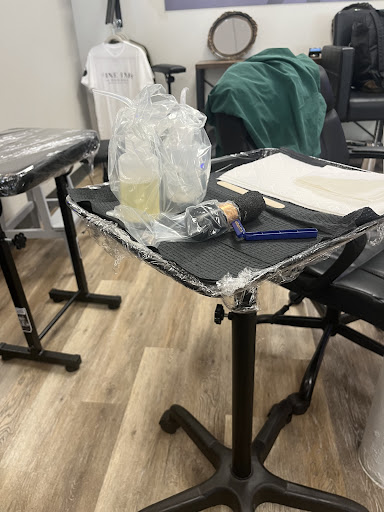 Explore chanel tattoo ideas, creative tattoo ideas in Ocoee, available at Fine Ink Studios Tattoos