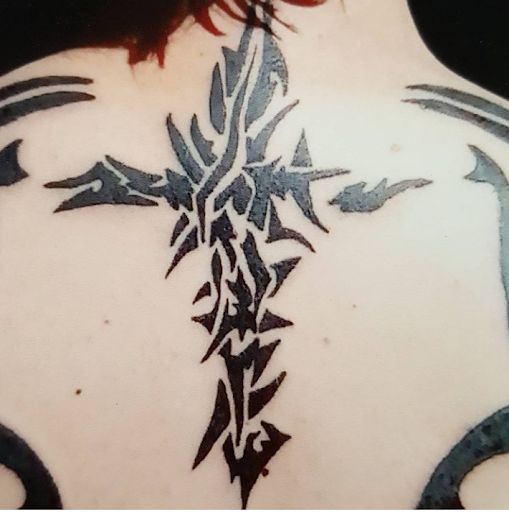 Explore rose sleeve tattoo ideas, creative tattoo ideas in Owosso, available at Twisted ink tattoo