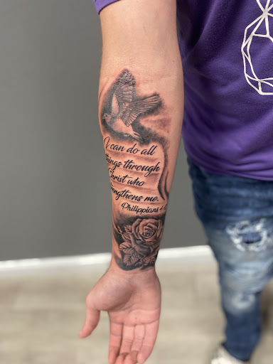 Explore love music tattoo ideas, creative tattoo ideas in Lakeland, available at Lyons Den Tattoo Company