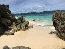 Photo de Cagban Beach avec baie longue