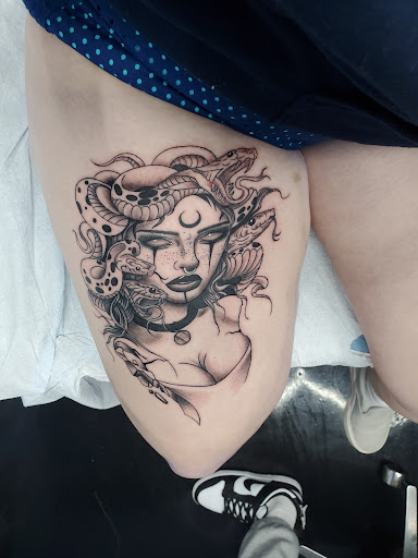 Explore tribal butterfly tattoo ideas, creative tattoo ideas in Erie, available at Code of Honor Tattoo