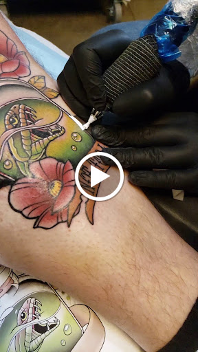 Explore triangle tattoo ideas, creative tattoo ideas in Tea, available at Red Arbor Tattoo