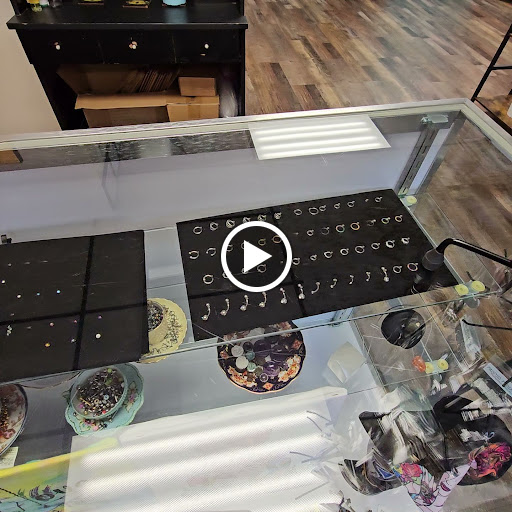 Find small wolf tattoo ideas for your next unique tattoo in Traverse City at Pinups & Needles