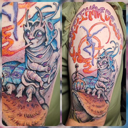 Explore olive branch tattoo ideas, creative tattoo ideas in Augusta, available at Mr. Tattoo