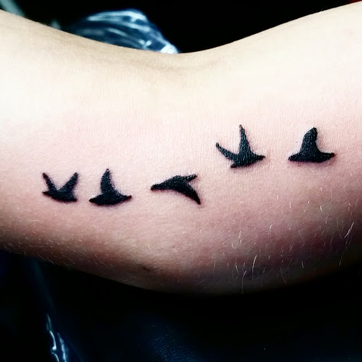 Explore silverback gorilla tattoo ideas, creative tattoo ideas in Erie, available at EliKingInk