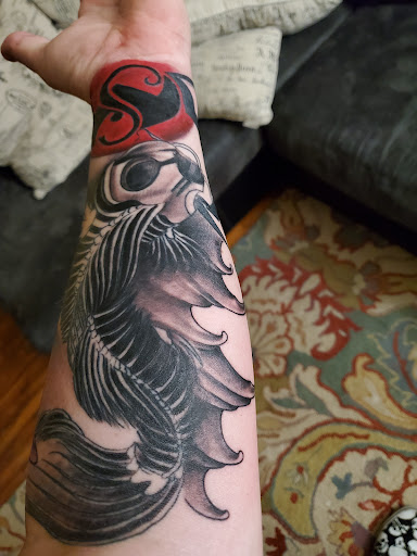 Explore tomahawk tattoo ideas, creative tattoo ideas in Clovis, available at Anchors & Arrows Tattoos & Piercings