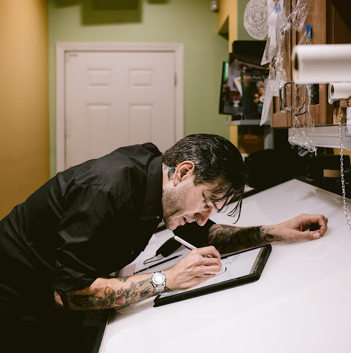 Explore black and white sleeve tattoo ideas, creative tattoo ideas in Islip, available at Blue Honeymoon Tattoo
