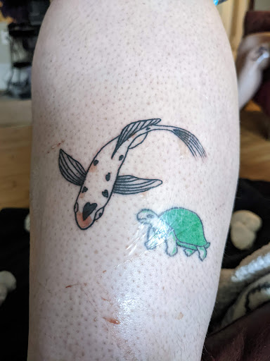 Explore hook tattoo ideas, creative tattoo ideas in Milwaukee, available at Atomic Tattoos