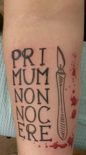 Explore interstellar tattoo ideas, creative tattoo ideas in Hebron, available at Explosive Ink Tattoo