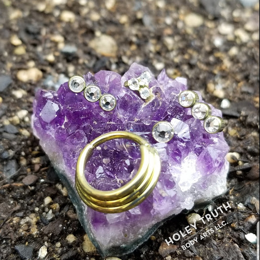 Explore book tattoo ideas, creative tattoo ideas in Lebanon, available at Holey Truth Body Arts LLC