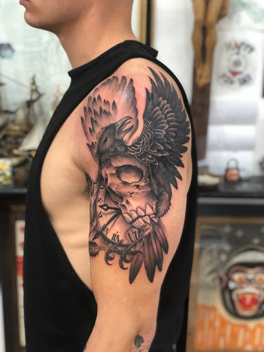 Explore men shoulder tattoo ideas, creative tattoo ideas in Placerville, available at Royal Six Tattoo