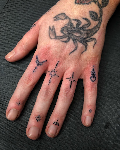 Explore stitch tattoos ideas, creative tattoo ideas in North Tonawanda, available at Dark Side Ink Tattoo Studio