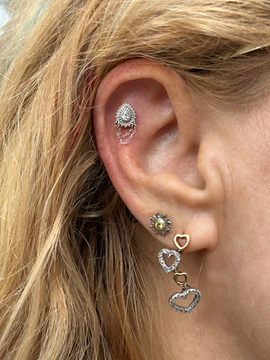 Explore guitarist tattoo ideas, creative tattoo ideas in Savannah, available at Planet 3 Piercing