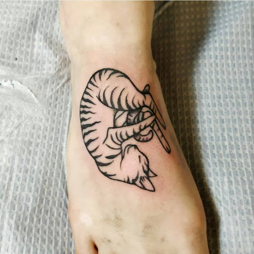 Explore hand tattoo ideas simple, creative tattoo ideas in Albany, available at Modern Body Art